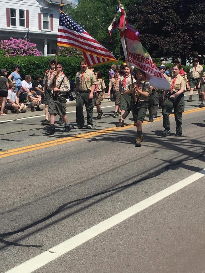 Troop 55 Riverside marching in a community parade